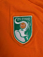 (S) Puma Poloshirt "Elfenbeinküste" in Orange