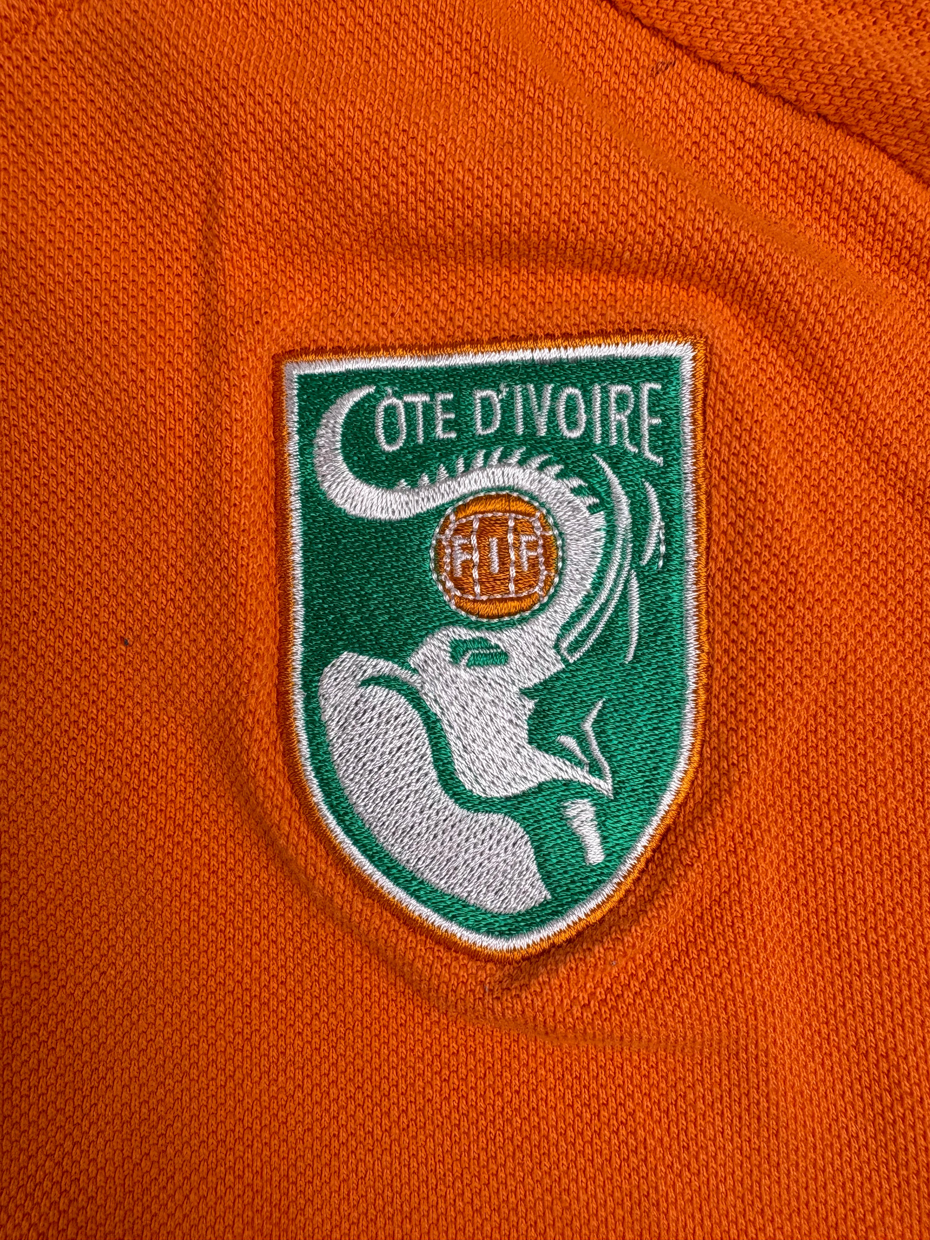 (S) Puma Poloshirt "Elfenbeinküste" in Orange
